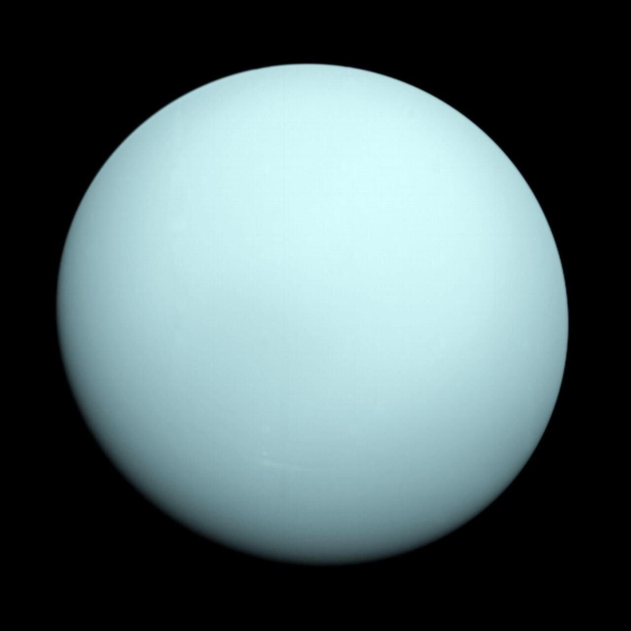 Urano, um planeta liso de cor azul-esverdeada pálida